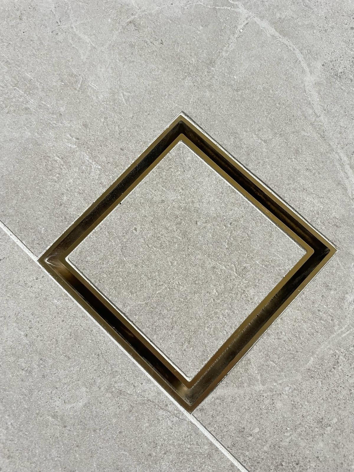 Brass detailing tiling detail by Jobson Tiling